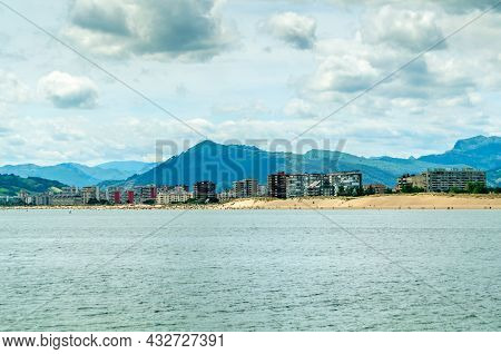 The Town Of Laredo, Seen From The Seafront In Santona, Spain