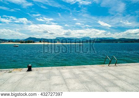 The Town Of Laredo, Seen From The Seafront In Santona, Spain