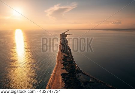 Long Spit With Sandy Beach Between Sea And Liman At Sunset, Aerial View From Drone. Blagoveshchenska