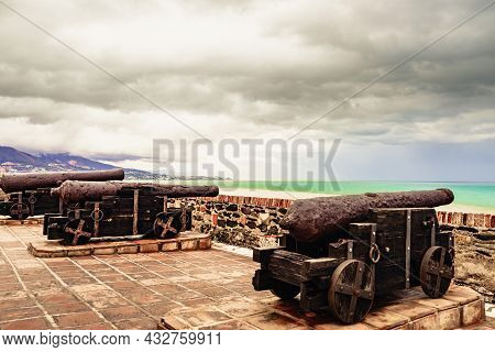 Old Cannon At Sohail Castle In Fuengirola, Near Malaga Spain. Tourist Attraction. Intersting Place T