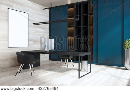 Modern Blue And Wooden Home Office Interior With Workplace, Empty White Mock Up Poster, Bookcase And