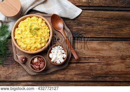 Traditional Ukrainian Banosh Served With Brynza And Pork Cracklings On Wooden Table, Flat Lay. Space