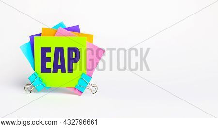 There Are Bright Multi-colored Stickers With The Text Eap Employee Assistance Program. Copy Space