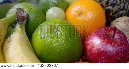 Healthy Fruits Apple, Banana, Sweet Lime, Orange, Pomegranate And Gooseberry And Other Some Fruits