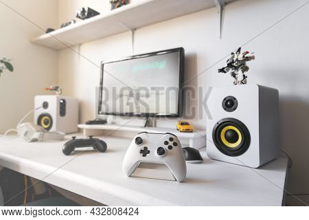General View Home Workplace Of Gamer With Computer And Gamepad.