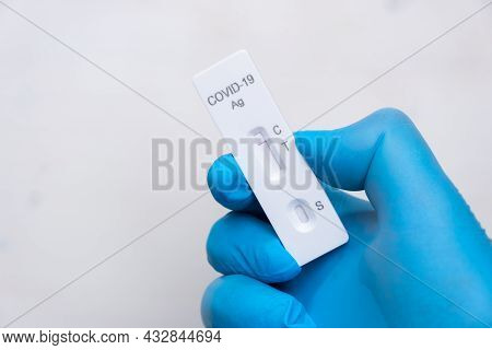 Negative Covid-19 Antigenic Test For Quick Detection Of Disease In Doctors Hand In The Rubber Gloves
