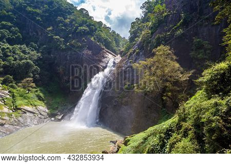 Dunhinda Waterfall In A Sunny Day In Sri Lanka