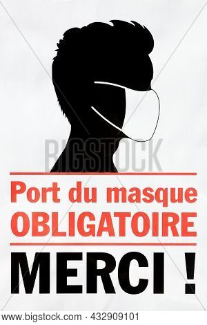 Wearing A Mask Is Compulsory, Thank You Symbol Called Port Du Masque Obligatoire Merci In French Lan