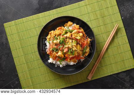 Traditional Thai Breakfast Gai Pad Pongali With Chicken, Eggs, Yellow Thai Curry Paste On Rice.
