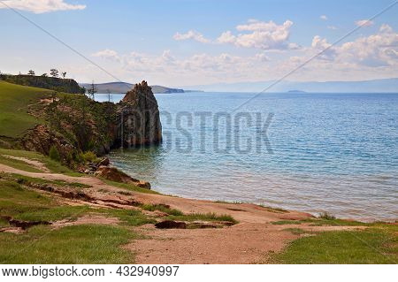 Lake Baikal, Olkhon Island On A Summer Day. Beautiful View Of The Khuzhir Bay Near The Shaman Rock