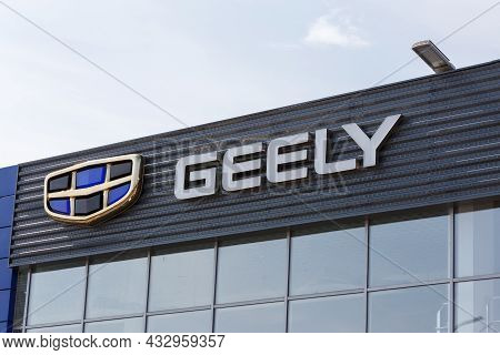 Geely Logo On Car Dealership Building At Sunny Day - Geely Is One Of The Largest Chinese Automobile 
