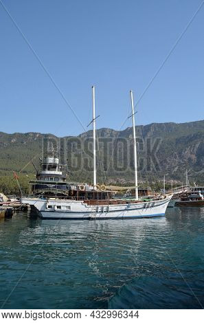 Boats and yachts at the in the marina of village Akyaka - slow city in Turkey.August 1,2021. Mugla,Turkey