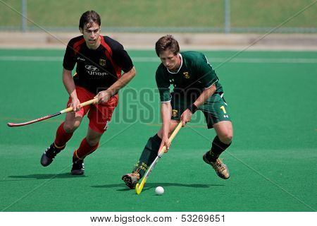 BLOEMFONTEIN, SOUTH AFRICA - MARCH 14: Players in action during an international men's field hockey game between Germany and South Africa March 14, 2009 in Bloemfontein. Germany won 4-3.
