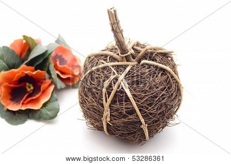 Straw ball with flower arrangement