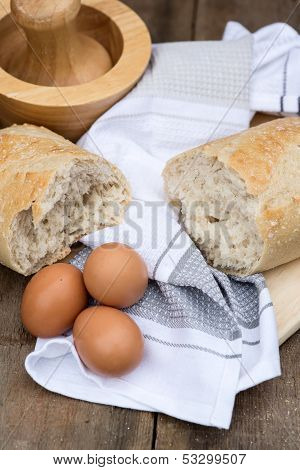 Loaf Of Sourdough Bread In Rustic Kitchend Setting