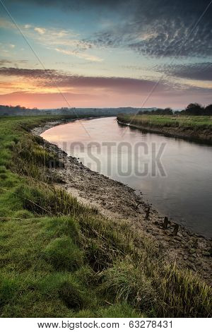 Stunning Vibrant Sunrise Reflected In Calm River