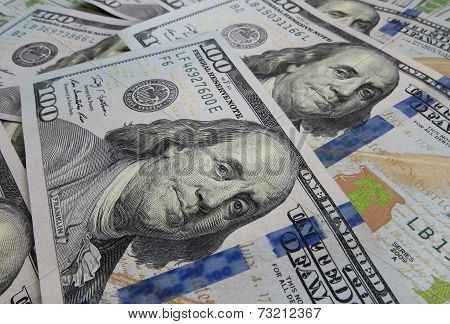 Photos of 100 dollar bills