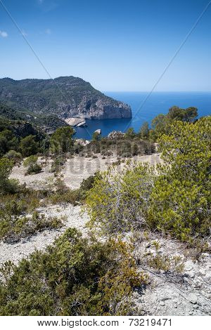 Landscape Image Of S'aguila Bay Cove On Mediterranean Island Of Ibiza