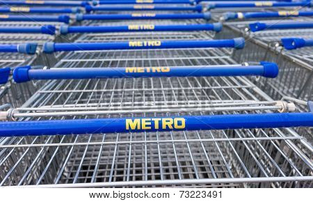 Samara, Russia - October 4, 2014: Large Empty Blue Shopping Cart Metro Store. Metro Group Is A Germa
