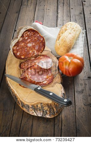 Morcon, A Spanish Sausage With Bread And Tomato