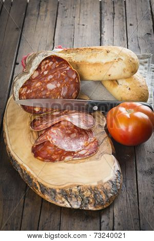Morcon, A Spanish Sausage With Bread And Tomato