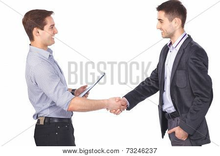 Two business men shaking hands and one of them holding a folder