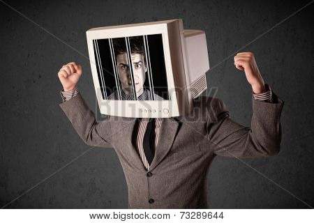 Business man with monitor screen on his head traped into a digital system concept