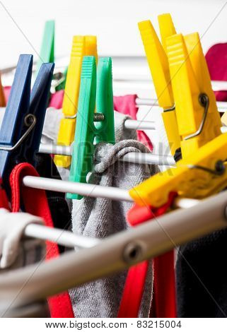 Mixed  Clean Laundry Pinned With Colourful Clothespins