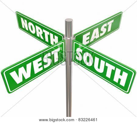 Four green road or street signs marked North, South, East and West to illustrate or point the way for travel to different parts of the country, state, county or city