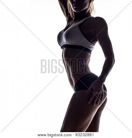 silhouette of attractive fitness woman, trained female body, lifestyle portrait, caucasian model