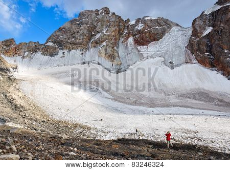 Lone Man Admiring The Stunning Views Of Glacier.