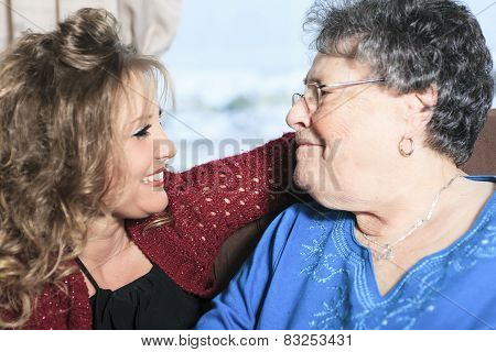 A grandchild with his grandmother in his room