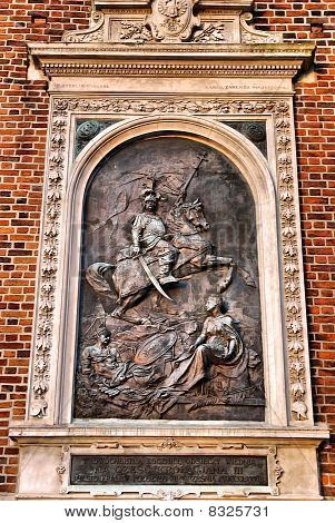 La Plaque dans le mur de l'église Sainte-Marie de Cracovie