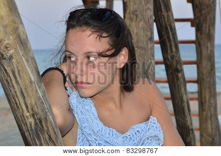 Portrait of a beautiful girl on a beach
