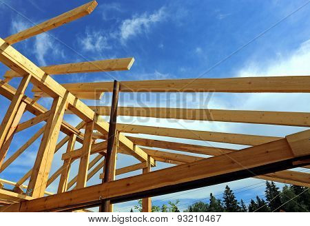 Installation Of Wooden Beams At Construction Of The Frame House