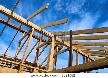 Installation Of Wooden Beams At Construction Of The Frame House