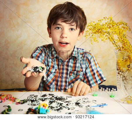 Preteen Hansome Boy Show  The Result Of His Rainbow Loom Hobby Panda