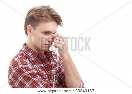 Anxious guy touching his head