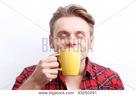 Nice guy smelling tea aroma