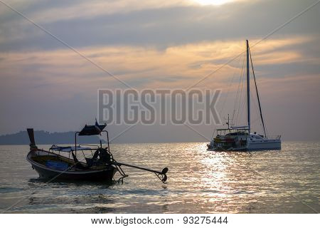 Catamaran and Long Tail Boat.