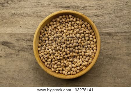 Bunch Of Chickpeas In Bowl On Old Wooden Background. Indian Cuisine