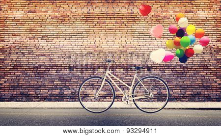 bicycle vintage with heart balloon