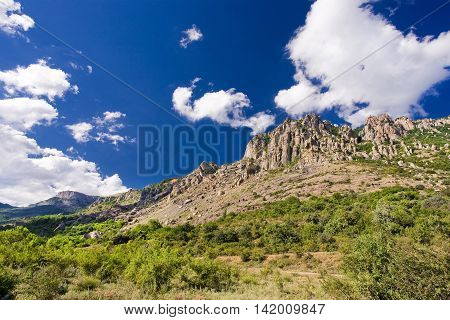 stone cliffs and blue sky in the Valley of ghosts in Crimea