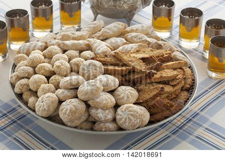 Traditional variety of Moroccan festive homemade cookies and tea