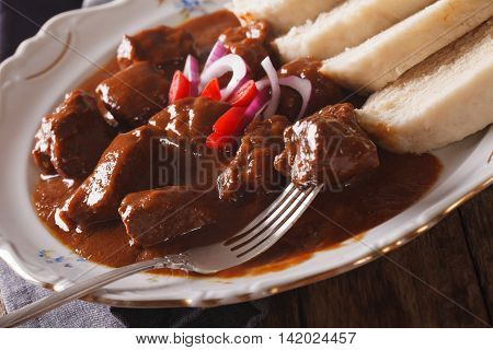 Hot Czech Goulash With Knedliks In A Plate Close-up. Horizontal