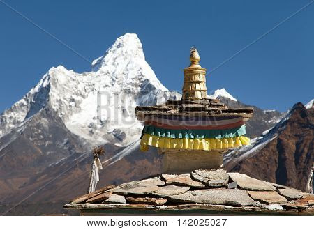 Buddhist Temple - detail of roof with mount Ama Dablam - Nepal