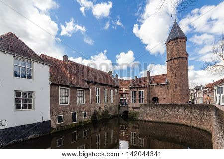Medieval town wall Koppelpoort and the Eem river in Amersfoort Netherlands