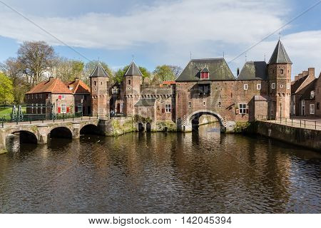 Medieval town wall Koppelpoort and the Eem river in Amersfoort Netherlands