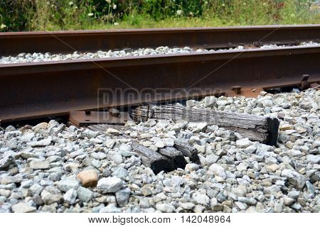 Rail road ties crumbling under rail lines