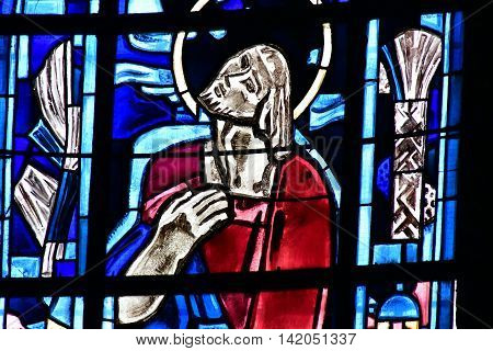 Poissy France - august 6 2016 : stained glass window of the historical collegiate church where the king Saint Louis was baptised